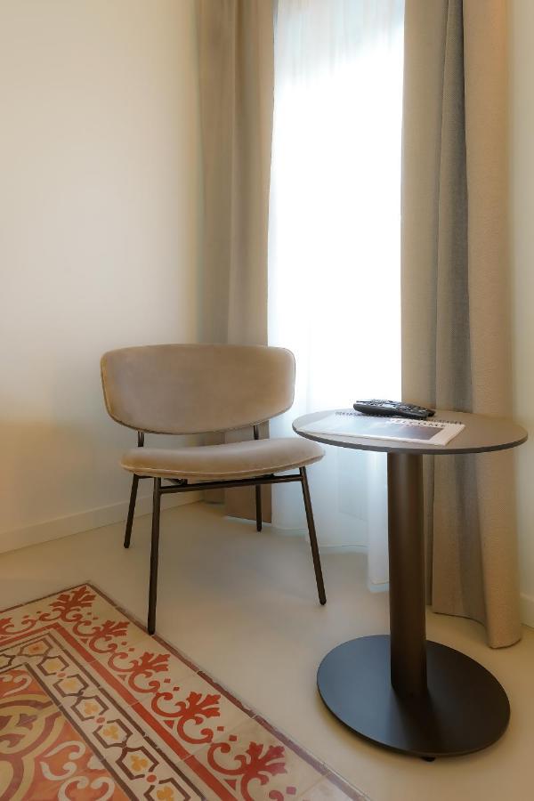 Bergamo Inn 21 Eksteriør billede A chair